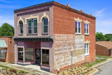 Prime corner commercial building available in the Kerr Lake - photo 1