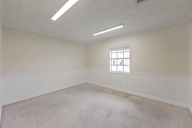 This office building consists of a lobby, reception area