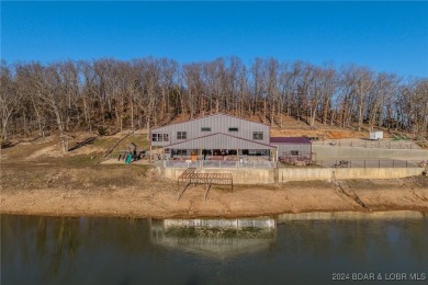 This extraordinary custom-built home offers 3,450 sf of living - Lake Home For Sale in Eldon, Missouri