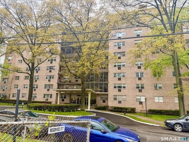 Stunning end unit 2-bedroom, 2-bath condo located in the - photo 1