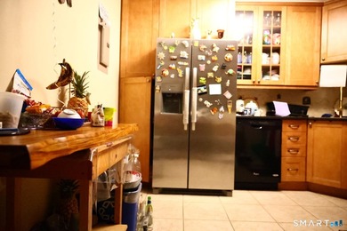 Stunning end unit 2-bedroom, 2-bath condo located in the - photo 7