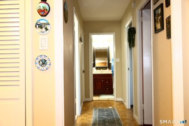Stunning end unit 2-bedroom, 2-bath condo located in the - photo 9