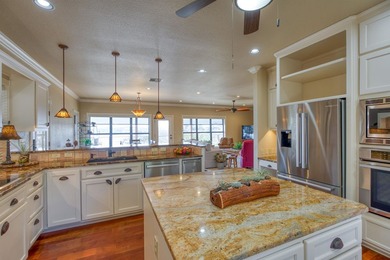 This stunning hill country estate is nestled within the gated - photo 5