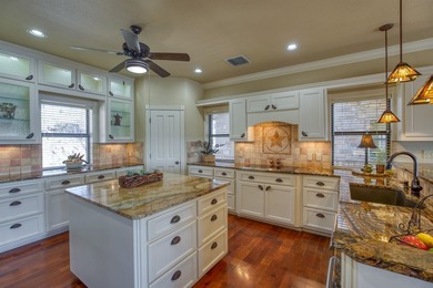 This stunning hill country estate is nestled within the gated - photo 6