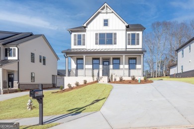 Lake Home For Sale in Flowery Branch, Georgia