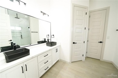 Step into modern elegance in Los Lagos, one of Edinburg's - photo 14