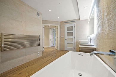 This beautiful unit has recently been renovated and offers a - photo 27