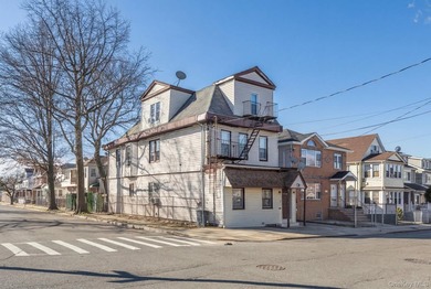 Welcome to this unique three-family home, a strong income - photo 1