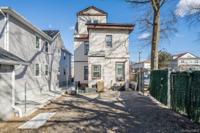 Welcome to this unique three-family home, a strong income - photo 3