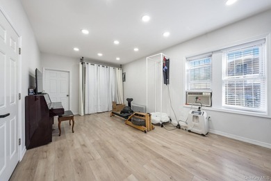 Welcome to this unique three-family home, a strong income - photo 5