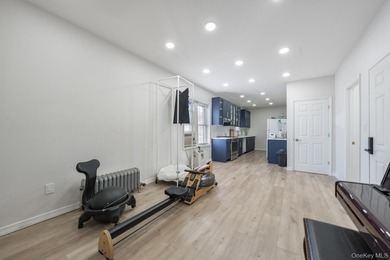 Welcome to this unique three-family home, a strong income - photo 7