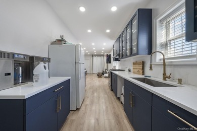 Welcome to this unique three-family home, a strong income - photo 9