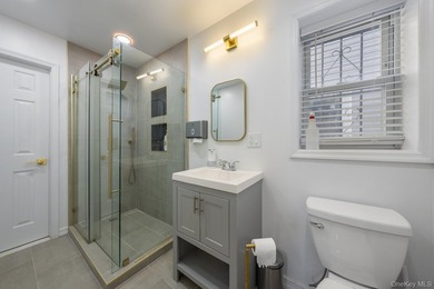 Welcome to this unique three-family home, a strong income - photo 10