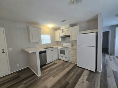 Own your own home in a quiet, well-maintained neighborhood! This - photo 3