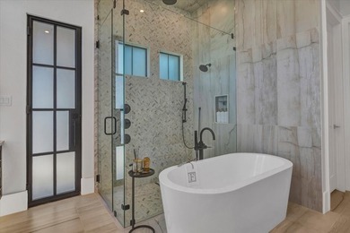 ELEVATED LIVING, EXPERTLY SCALED! This stunning SINGLE story - photo 22