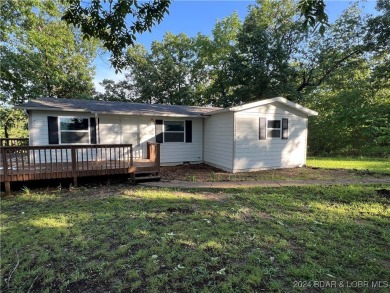 Lake Home For Sale in Sunrise Beach, Missouri