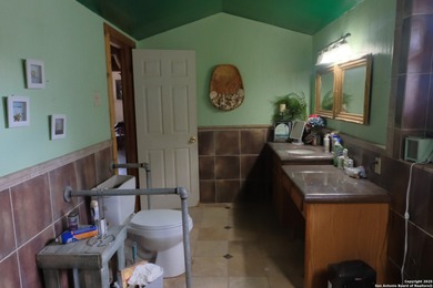 Located in Marion, this charming farmhouse sits on 25.7 acres of