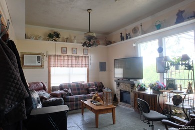 Located in Marion, this charming farmhouse sits on 25.7 acres of