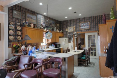 Located in Marion, this charming farmhouse sits on 25.7 acres of