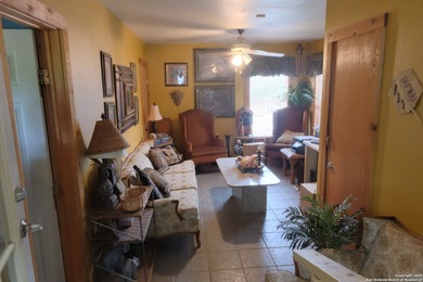 Located in Marion, this charming farmhouse sits on 25.7 acres of