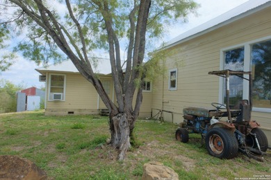 Located in Marion, this charming farmhouse sits on 25.7 acres of
