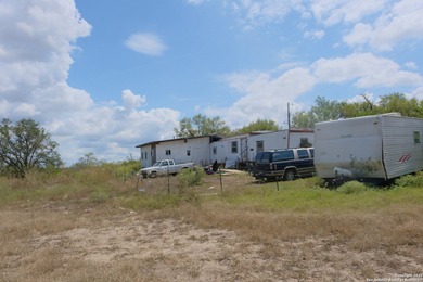 Located in Marion, this charming farmhouse sits on 25.7 acres of