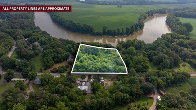 Discover your own riverfront retreat with this 2+/- acre tract - photo 1