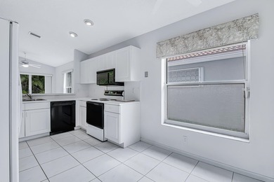 You must see this home in Palm Isles, a premier 55+ community - photo 17