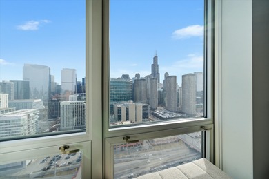 Perched on the 27th floor, this expansive one-bedroom, one-bath