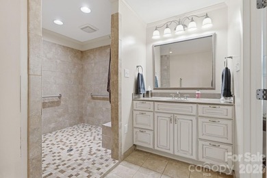 Enjoy the best of lake living in this beautifully designed - photo 18