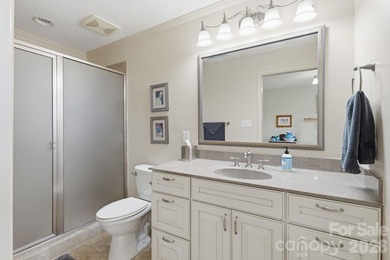 Enjoy the best of lake living in this beautifully designed - photo 25