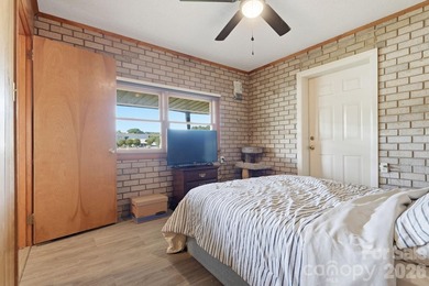 Enjoy the best of lake living in this beautifully designed - photo 29