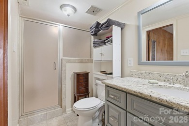Enjoy the best of lake living in this beautifully designed - photo 30
