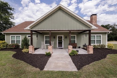 Experience luxury lake living in this stunning custom built - photo 1