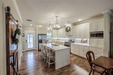 Experience luxury lake living in this stunning custom built - photo 9