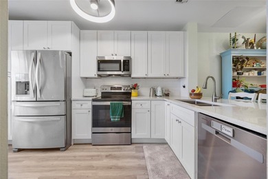 What a great value for this contemporary townhome in the gated - photo 2