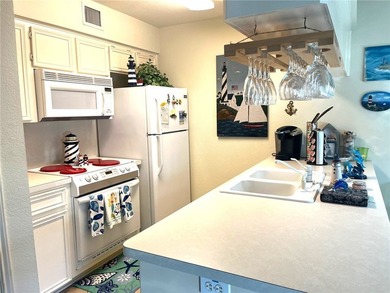 CORNER UNIT! This 1 bedroom, 1 bathroom ground floor unit is a - photo 7