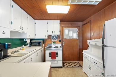 Tucked away on the sought-after Little Niangua Arm, this 3 bed - photo 12