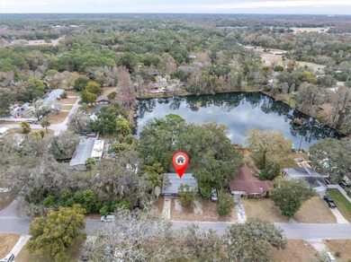 PRICE REDUCTION! On this Rare Lake Front Home with your own - photo 3
