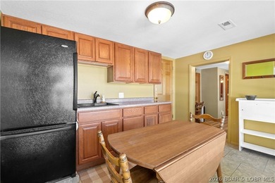 Tucked away on the sought-after Little Niangua Arm, this 3 bed - photo 14