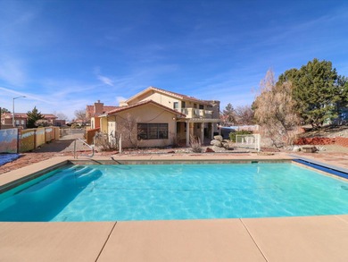 Situated on a .38 acre lot in the Sandia Foothills, this home is