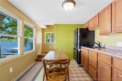 Tucked away on the sought-after Little Niangua Arm, this 3 bed - photo 15