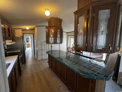 Welcome to your slice of country living! Nestled on 4.48