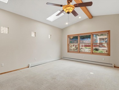 Situated on a .38 acre lot in the Sandia Foothills, this home is