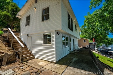 Tucked away on the sought-after Little Niangua Arm, this 3 bed - photo 50