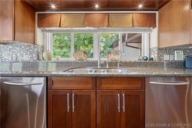 Experience true Lake of the Ozarks living at this exceptional - photo 18