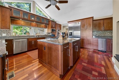 Experience true Lake of the Ozarks living at this exceptional - photo 19