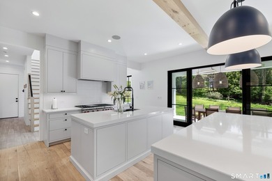 Introducing 13 Sunswyck Rd, a distinguished custom residence set - photo 8