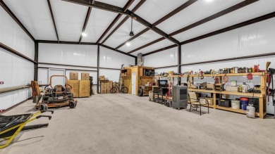 Welcome to 117 Hansma Way, a breathtaking custom ranch estate in