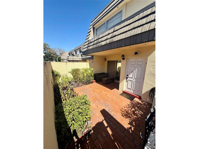 Welcome to this charming condominium located at 8785 SW 137th